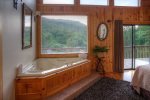 Master bathroom with spa robes for the hot tub